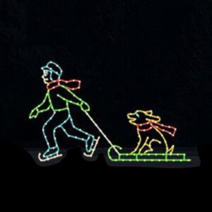BOY PULLING DOG ON SLED